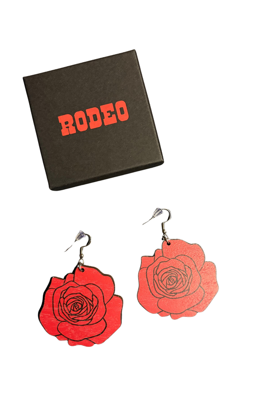 Ruusu korvakorut roikkuvat